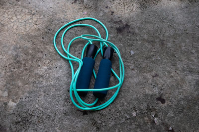 High angle view of telephone on tiled floor