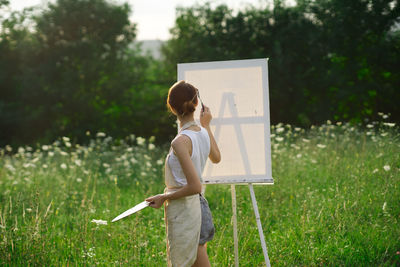 Full length of man standing on field