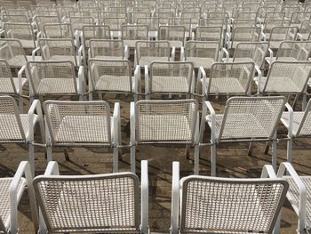 Full frame shot of empty chairs in row
