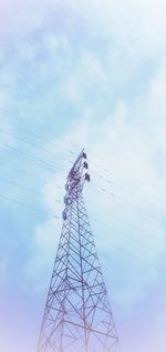 Low angle view of electricity pylon against sky