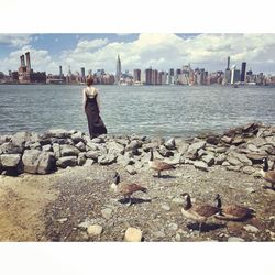 People in front of cityscape
