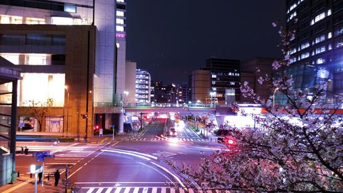 Modern buildings in city at night