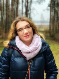 Portrait of beautiful young woman in winter