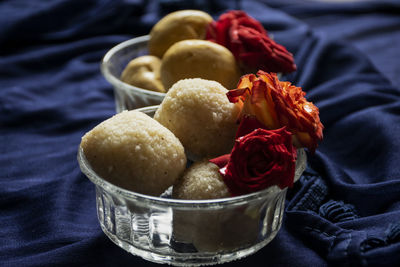 High angle view of roses in bowl on table