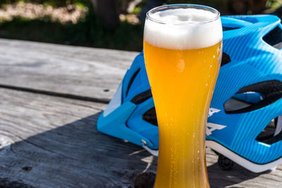 Close-up of beer glass on table