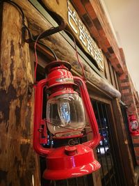 Low angle view of illuminated telephone booth