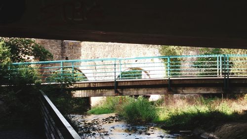 High angle view of footbridge over river