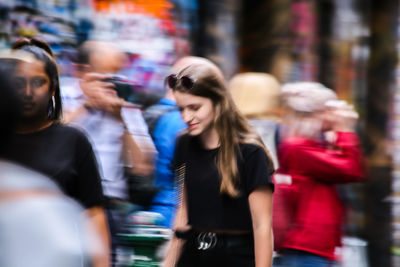 Young woman on street in city