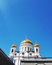 Low angle view of a building against blue sky