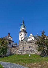 View of church of st. catherine and castle in kremnica, slovakia