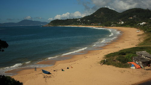 View of calm beach against the sky