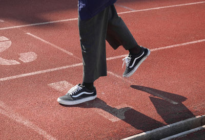 Low section of man running