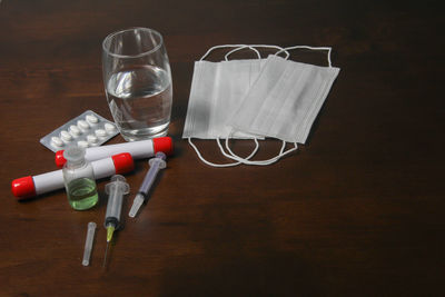 High angle view of glasses on table