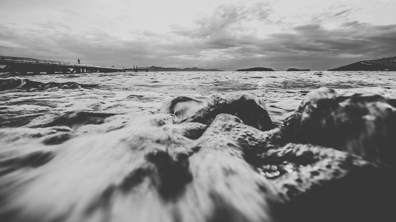 sea, water, sky, beach, shore, cloud - sky, nature, tranquility, scenics, beauty in nature, tranquil scene, sand, wave, rock - object, cloud, outdoors, day, horizon over water, cloudy, no people