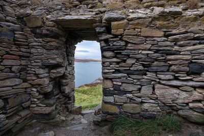 View of stone wall against sky