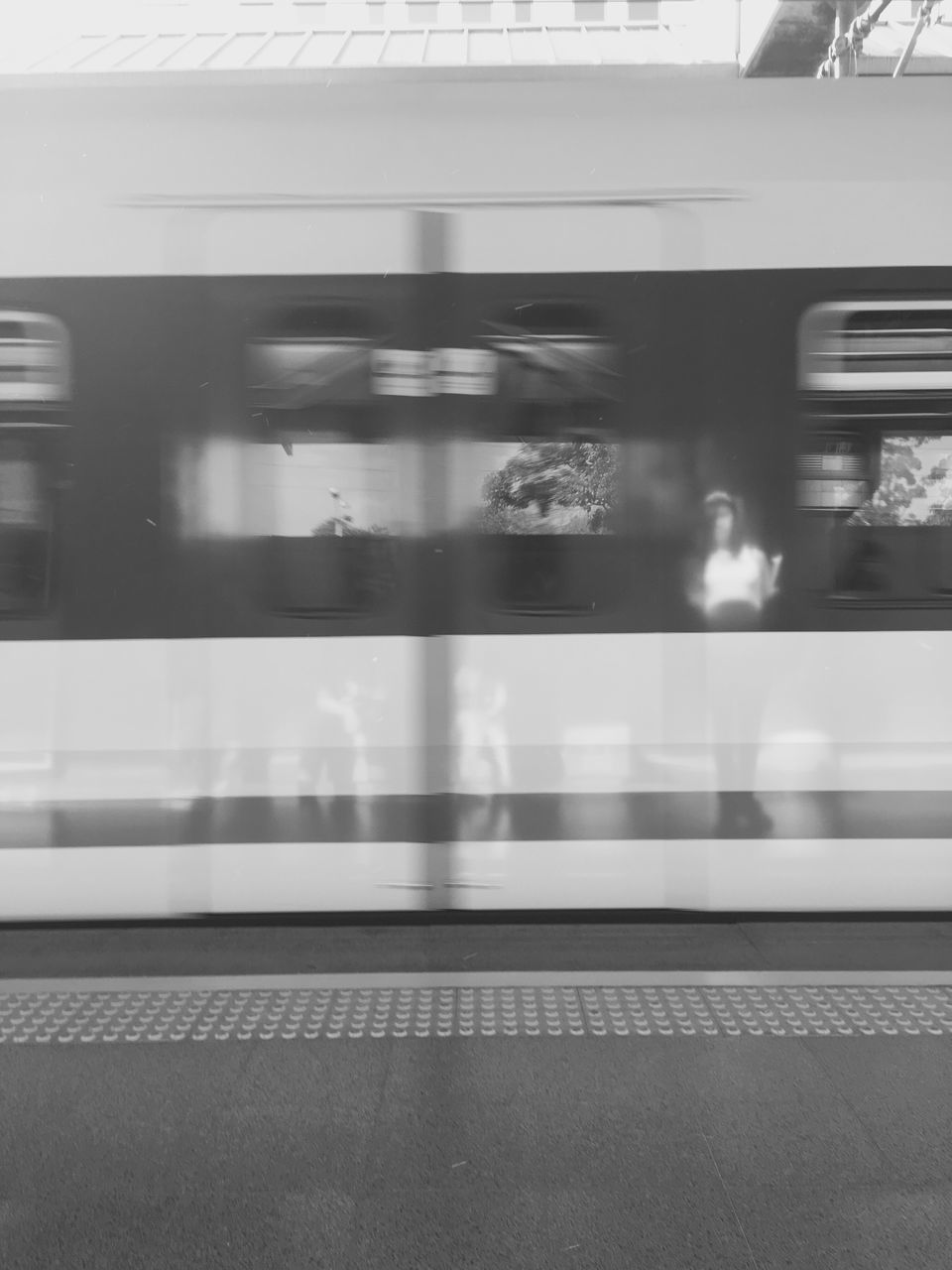 transportation, blurred motion, train - vehicle, public transportation, speed, mode of transport, rail transportation, motion, passenger train, railroad station platform, metro train, railroad station, indoors, journey, long exposure, travel, subway train, no people, commuter train, day