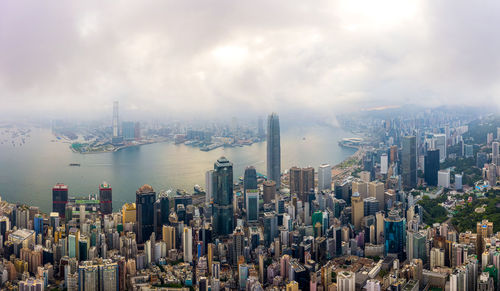 Panoramic view of city and buildings against sky