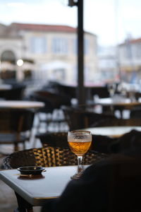 Wine glass on table at restaurant