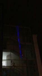 Low angle view of illuminated lights
