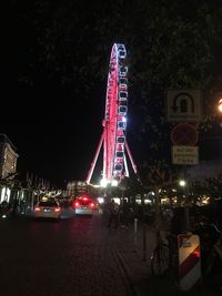 View of illuminated city at night