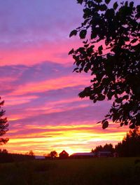 Scenic view of landscape at sunset