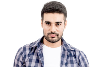 Close-up of handsome bearded man against white background