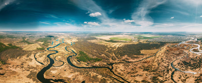 Aerial view of cityscape against sky