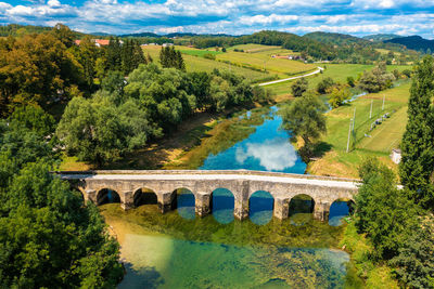 Arch bridge over landscape