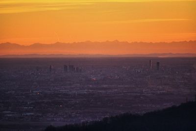 View of cityscape at sunset