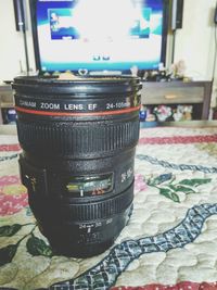 Close-up of camera on table