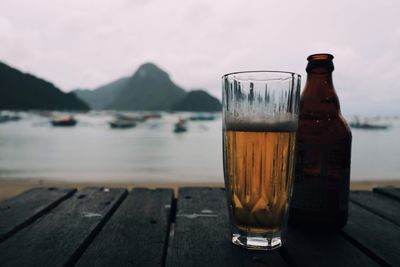 Close-up of beer glass on table