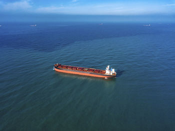 High angle view of ship in sea against sky