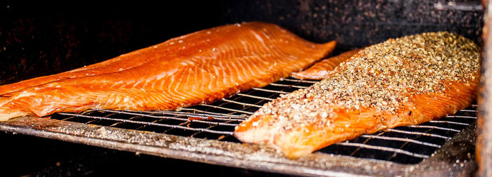 Close-up of meat on barbecue grill