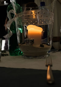 Close-up of wine in glass on table