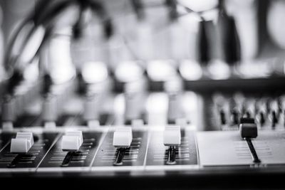 Close-up of sound mixer at recording studio