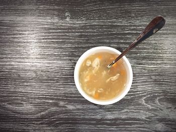 Directly above shot of coffee on wooden table