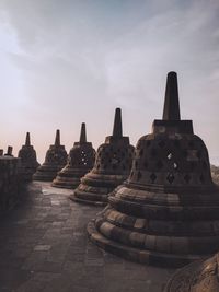 Ancient temple against sky