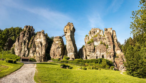 Panoramic shot of rocks on land against sky