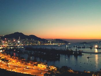 High angle view of illuminated city at night