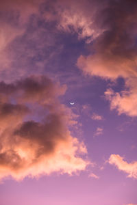 Low angle view of dramatic sky during sunset