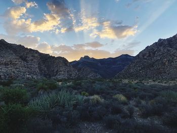 Scenic view of mountains against sky during sunset