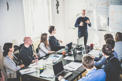 Business colleagues working in office