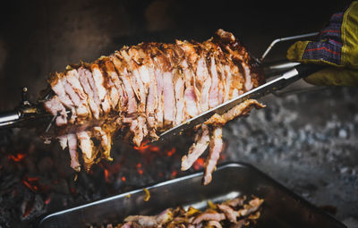 High angle view of meat on barbecue grill