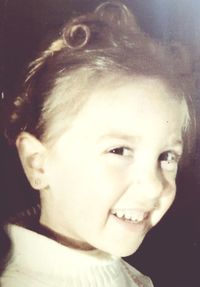 Close-up portrait of smiling boy