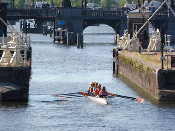 People on boat in river