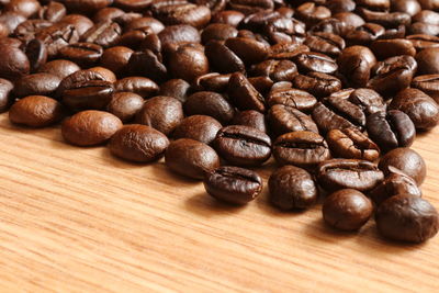 Close-up of coffee beans on table