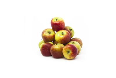 Close-up of apples on white background