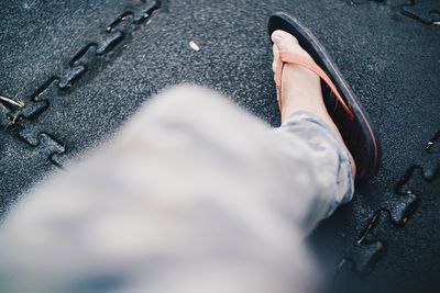 Low section of man on road