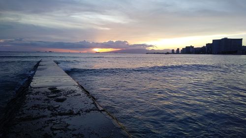 Scenic view of sea against sky during sunset