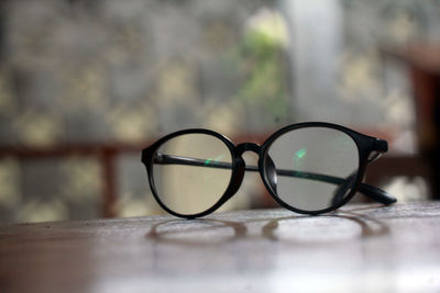 Close-up of eyeglasses on table